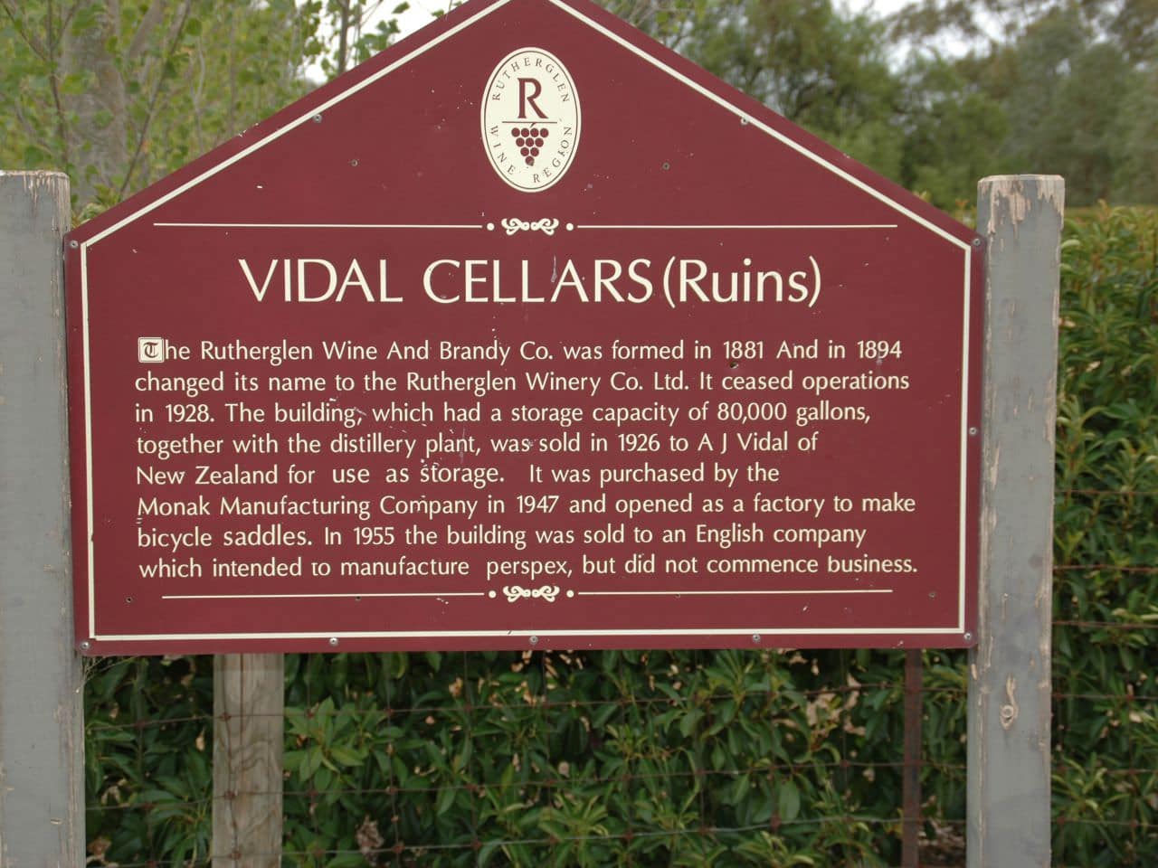 Burgundy plaque showing history of Vidal Cellars ruins