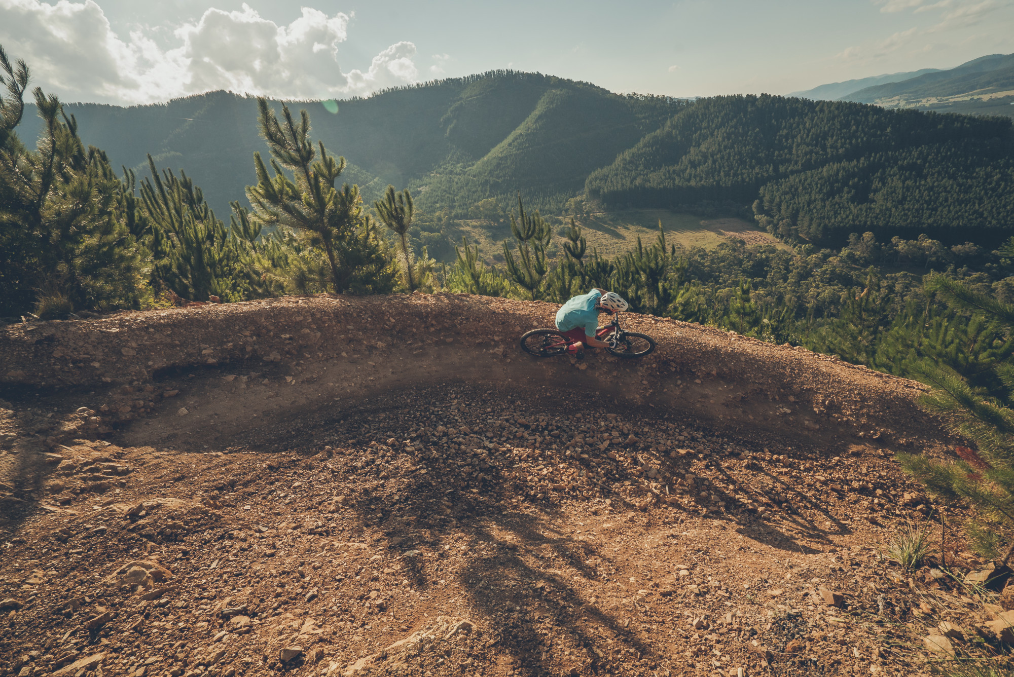 Mountain Biker riding berms at Mystic Bike Park