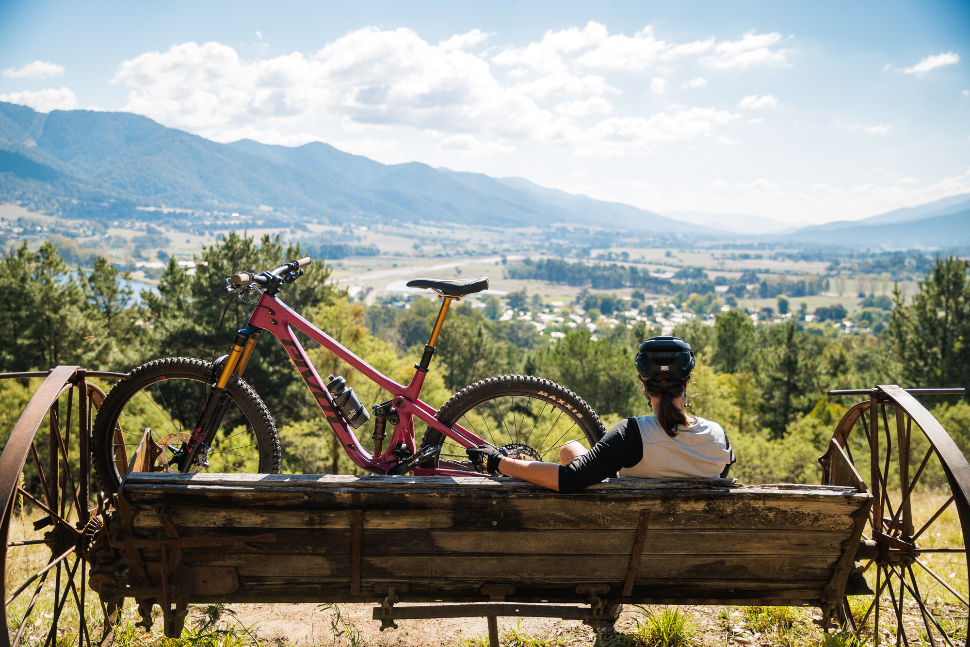 Cyclist looking at the view over Mount Beauty township from Big Hill Mountain Bike Park