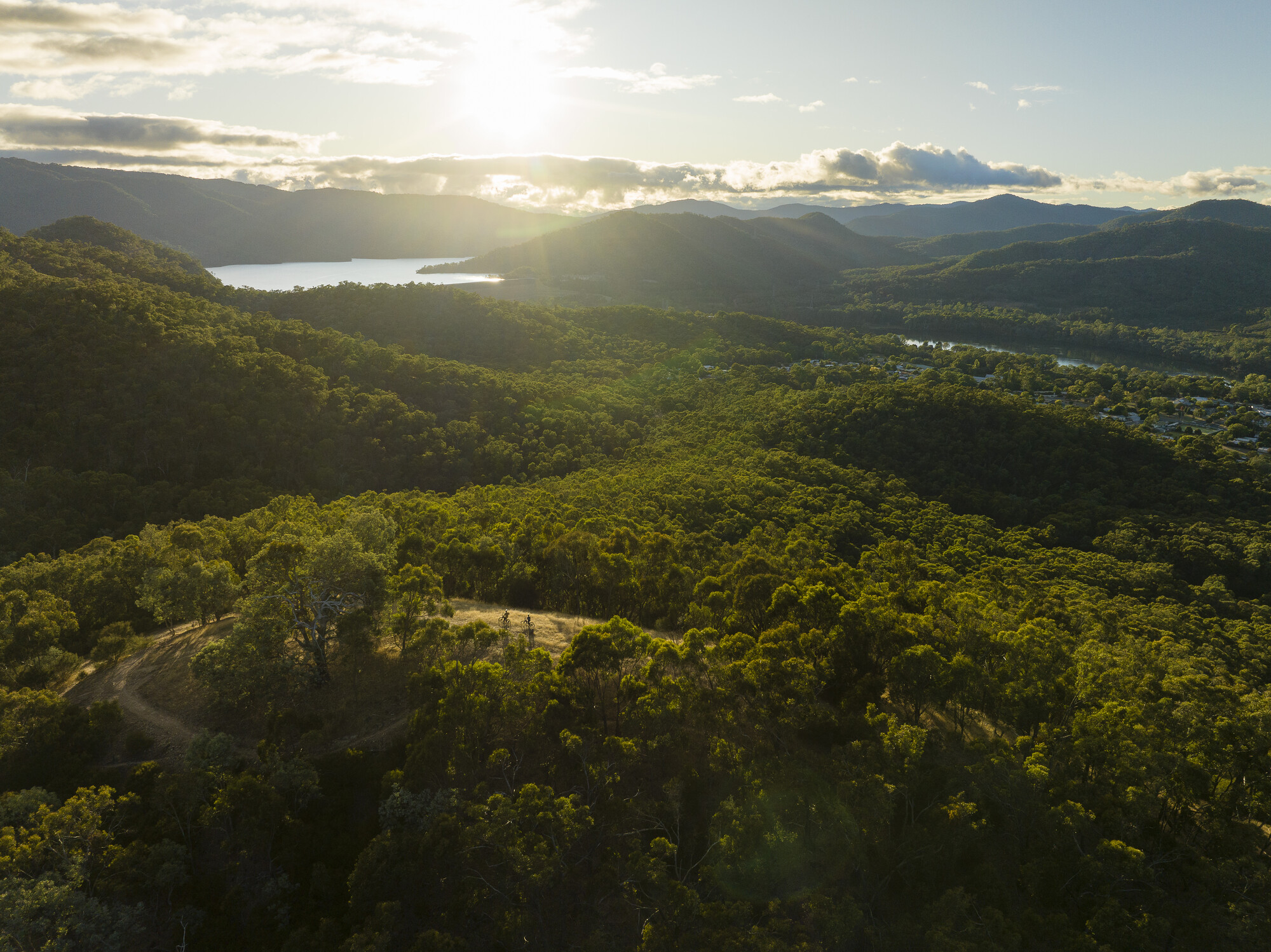 Two cyclists soaking in the view at Eildon Mountain Bike Park