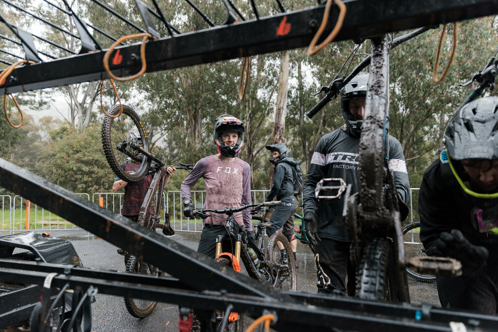 Cyclists loading bikes on gravity bike shuttles at Mt Buller