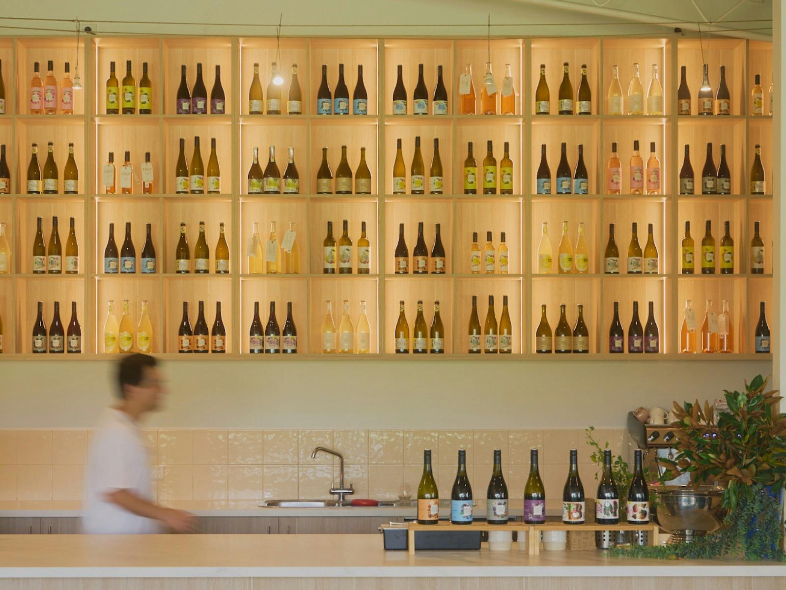 Dal Zotto Wines Cellar Door Bar Area with large Bottle Display