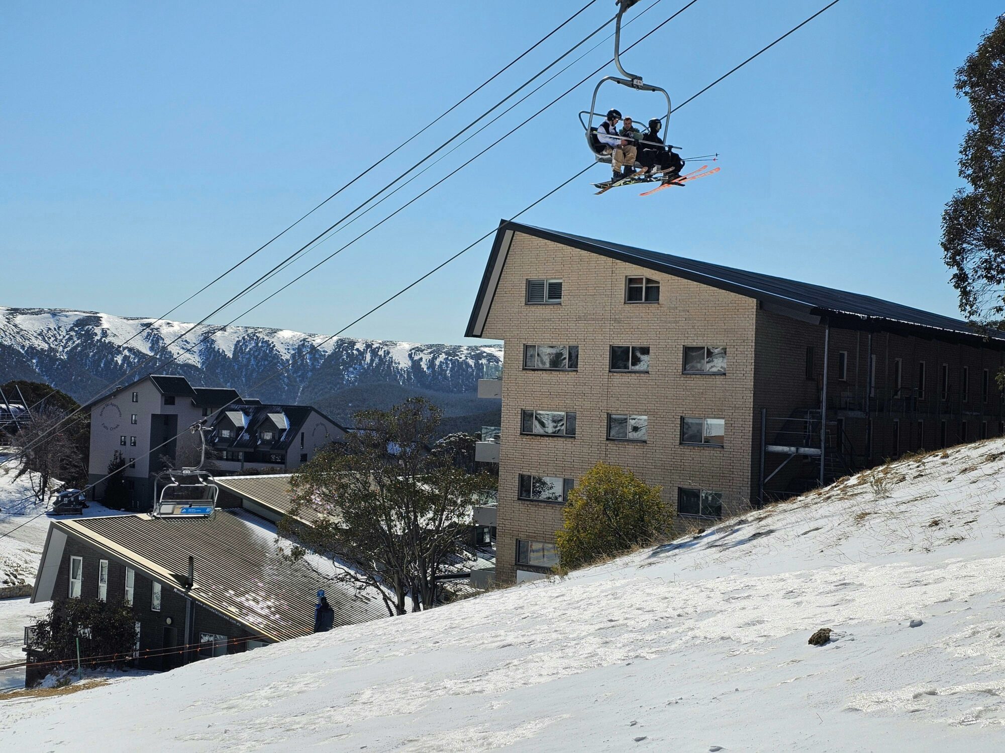 View of the Eagle Chairlift and the alpine mountains in the background