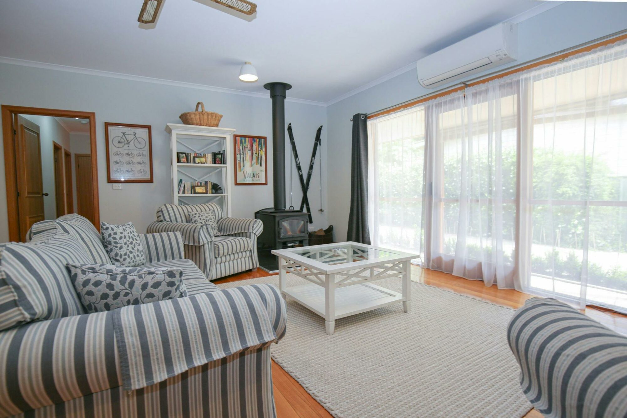 Living area with TV and fireplace Bright Country Home - Bright Accommodation Alpine Valley Getaways