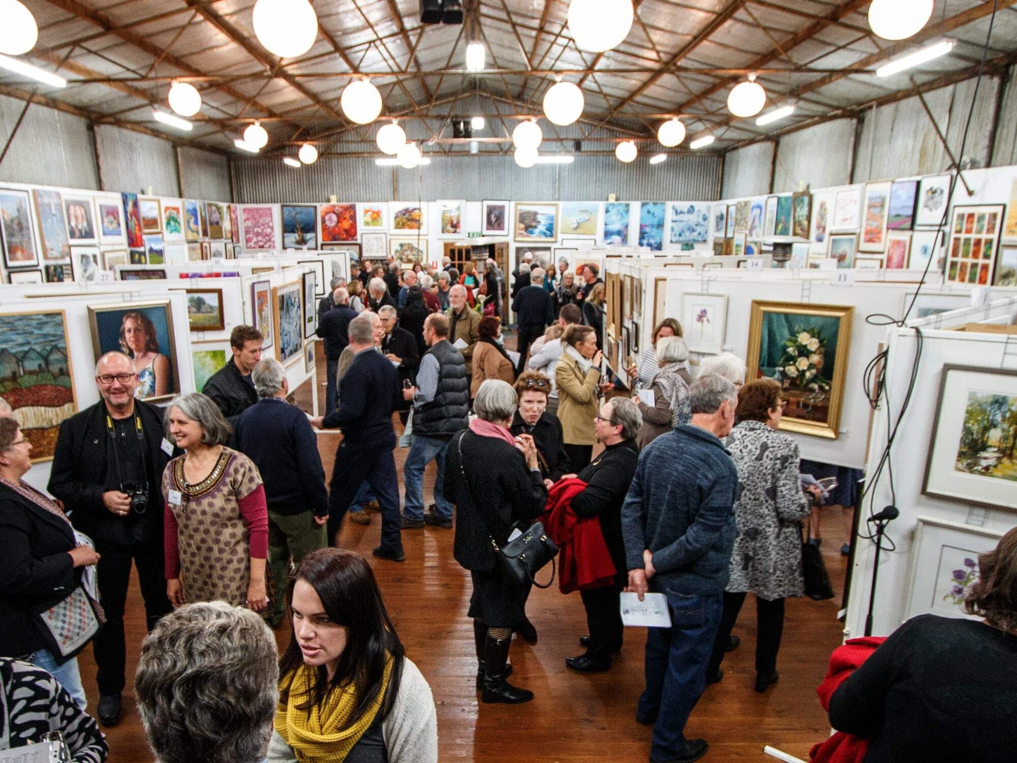 local crowd enjoying King Valley Art Show opening night