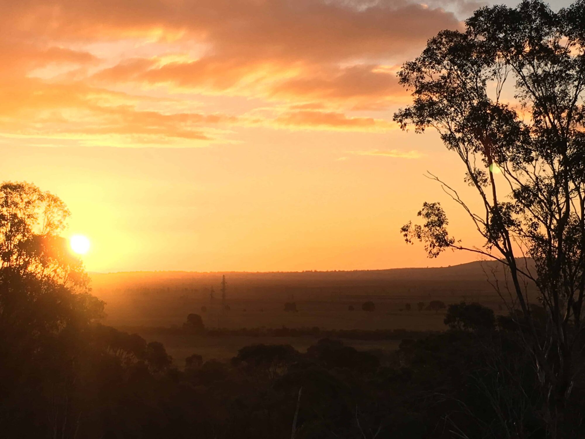 The orange glow of sunset at Days lookout, Winton