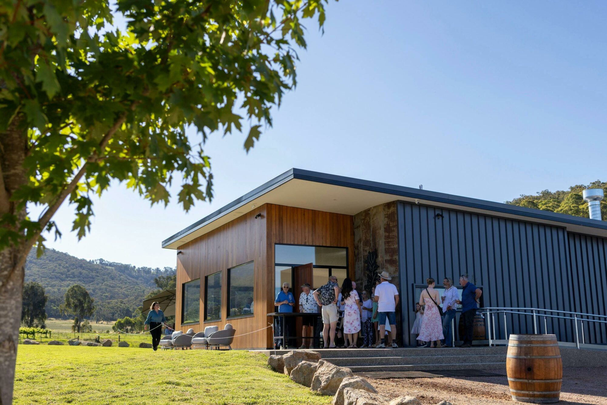 View of cellar door entrance with guests gathered at the front door.