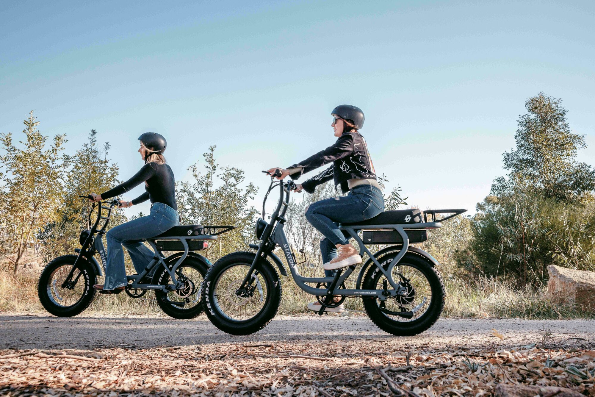 Two friends riding E-Bikes at BIG4 Rutherglen Holiday Park