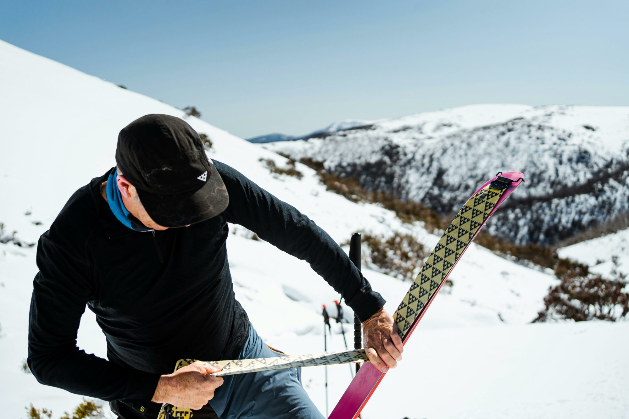 Man with skiiing equipment