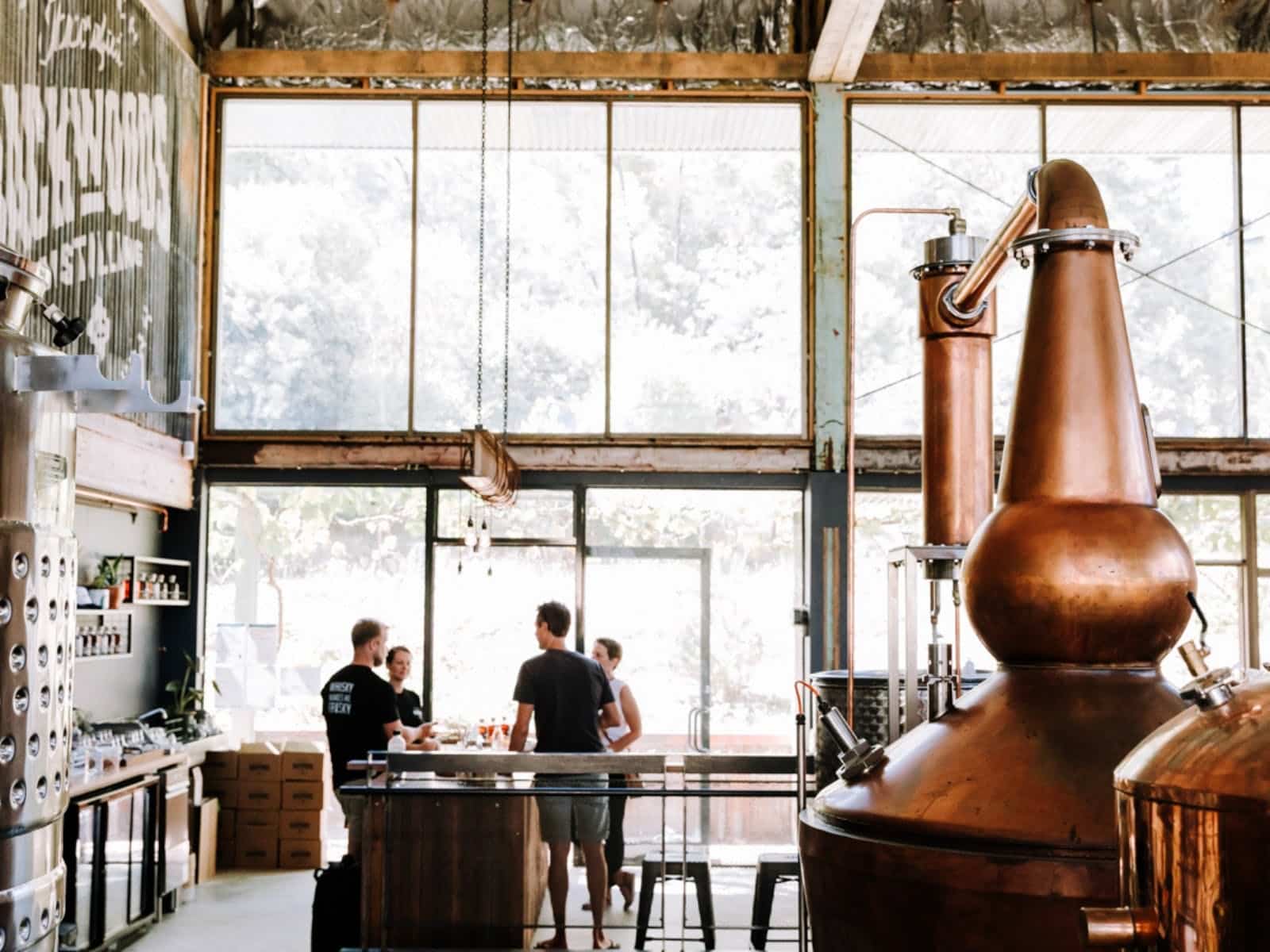 View of the tasting room with the copper stills