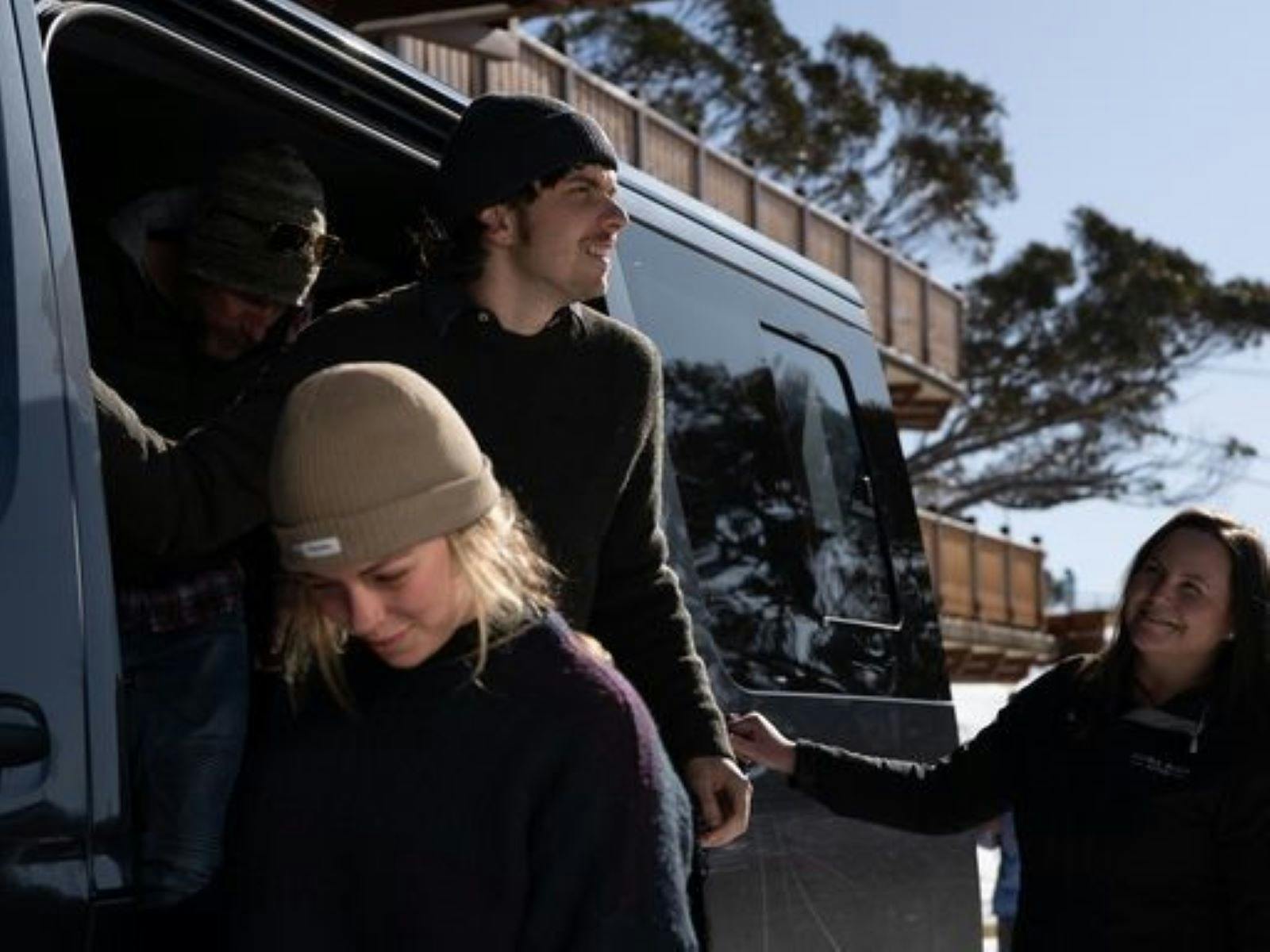 Guests being delivered by private transfer to their accommodation in the snow
