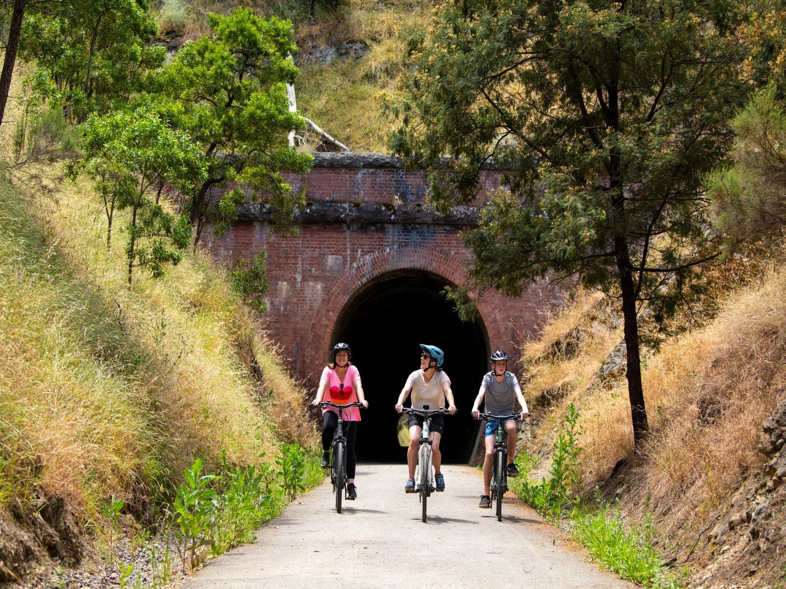 Guests exploring the Cheviot Railway Tunnel along the Great Victorian Rail Trail