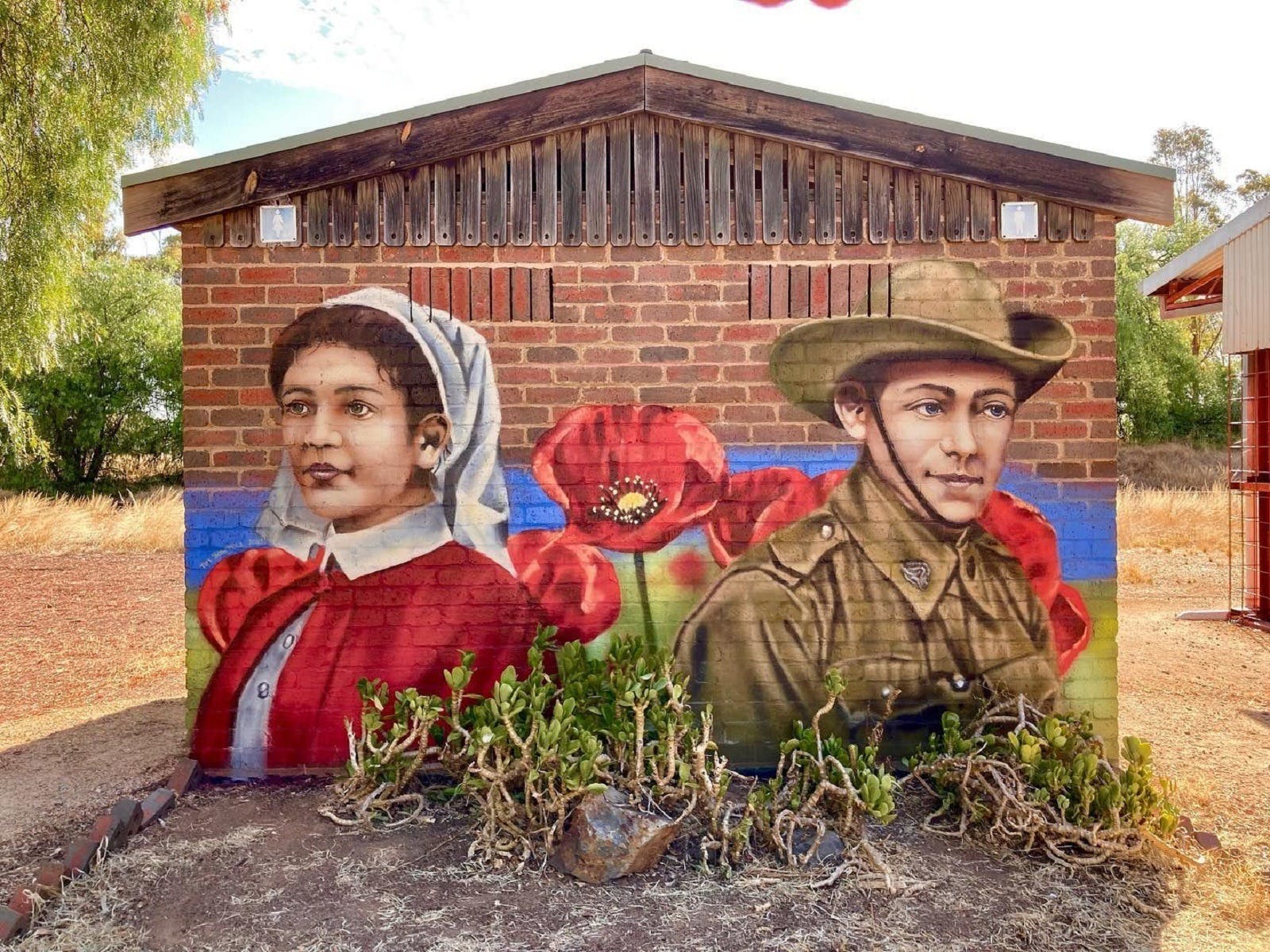 Military mural painted by Tim Bowtell