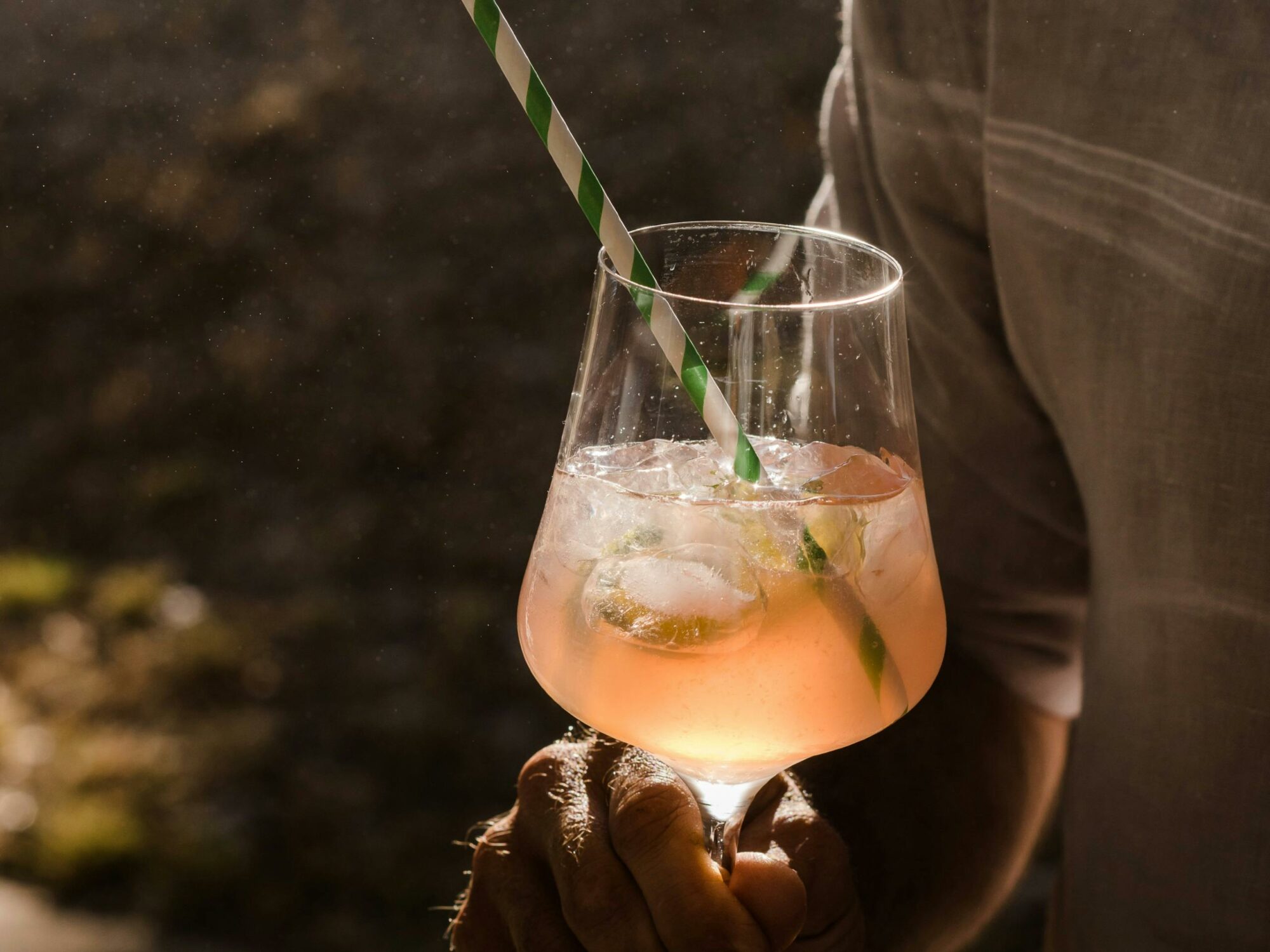 Close up of hand holding muscat spritz