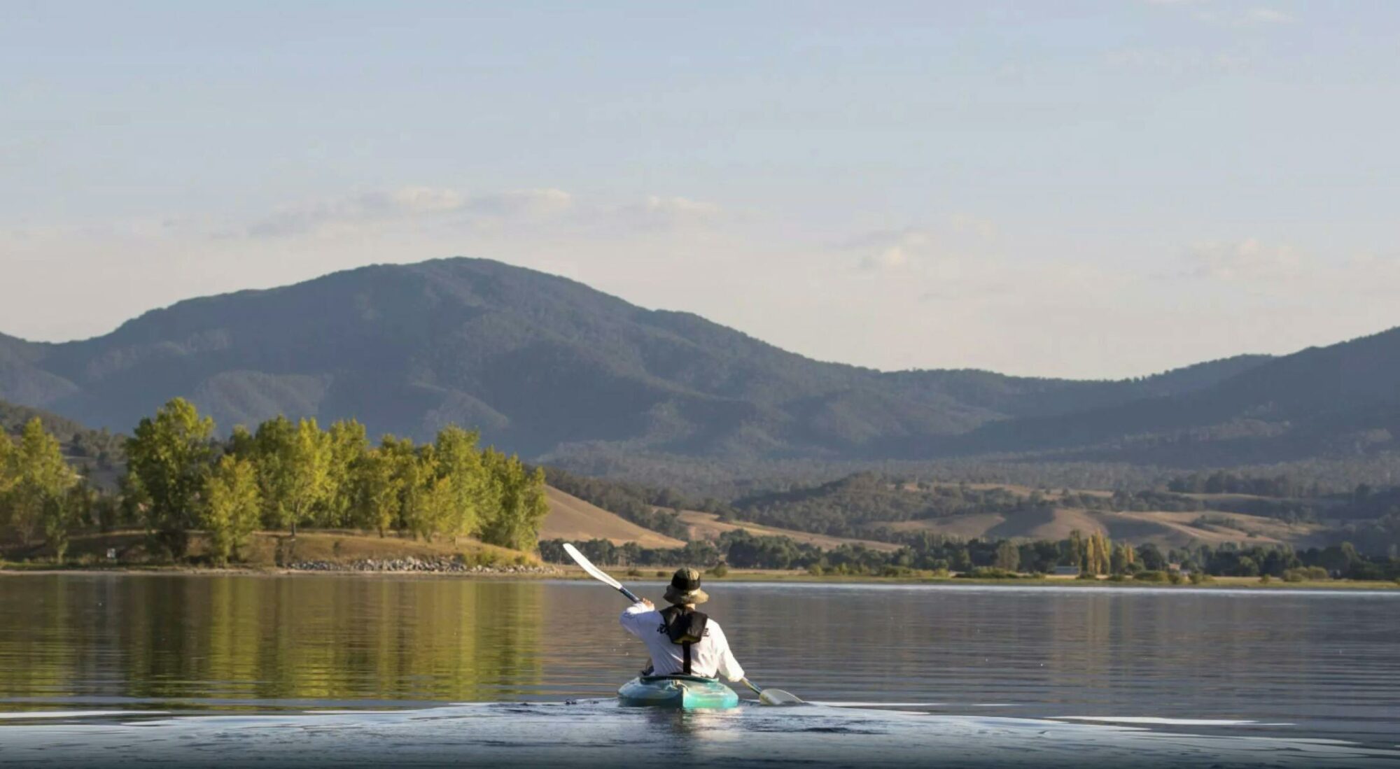 Kayaking the still waters of Khancoban Pondage in the soft light