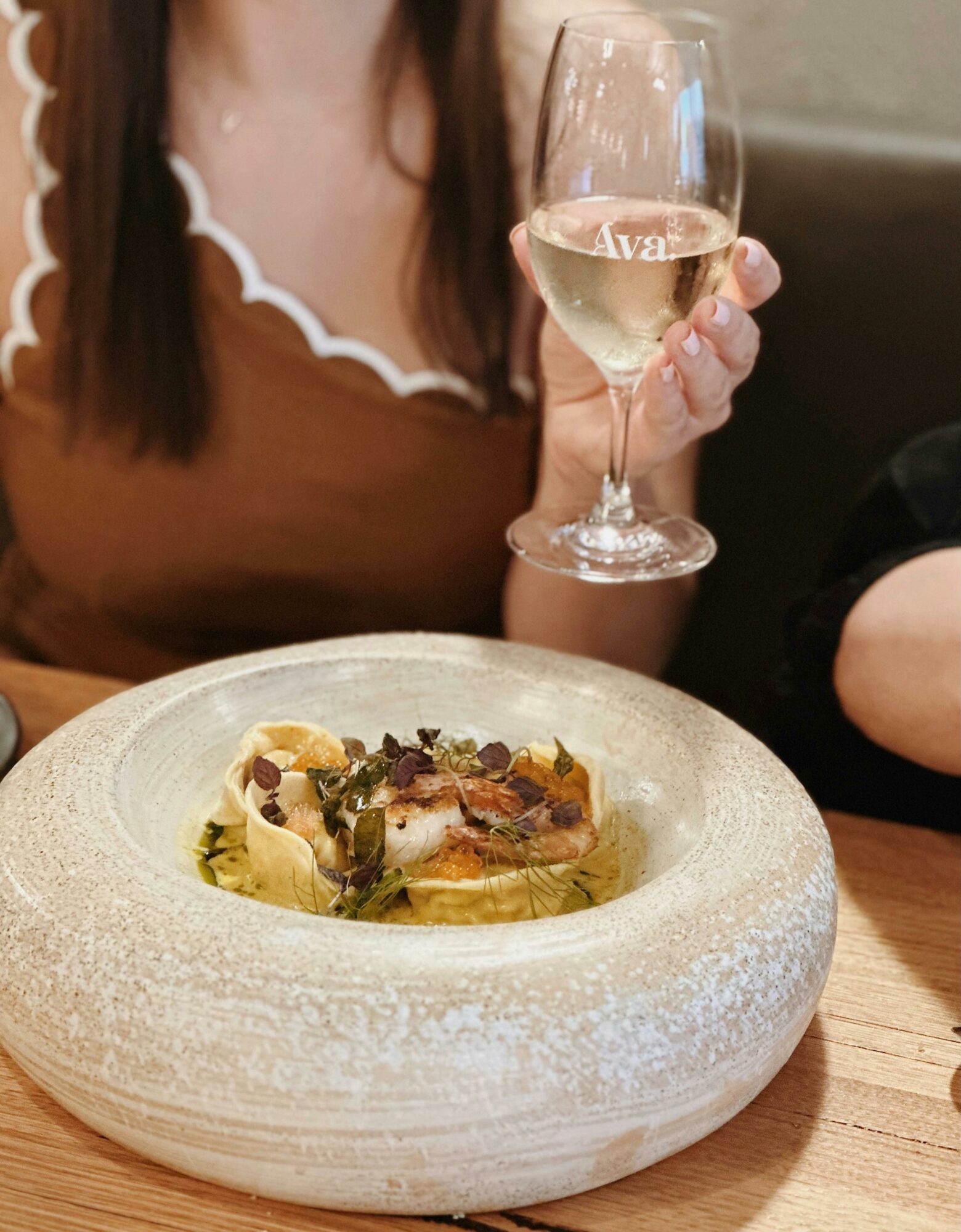 Signature dish, prawn and scallop tortellini with laksa
