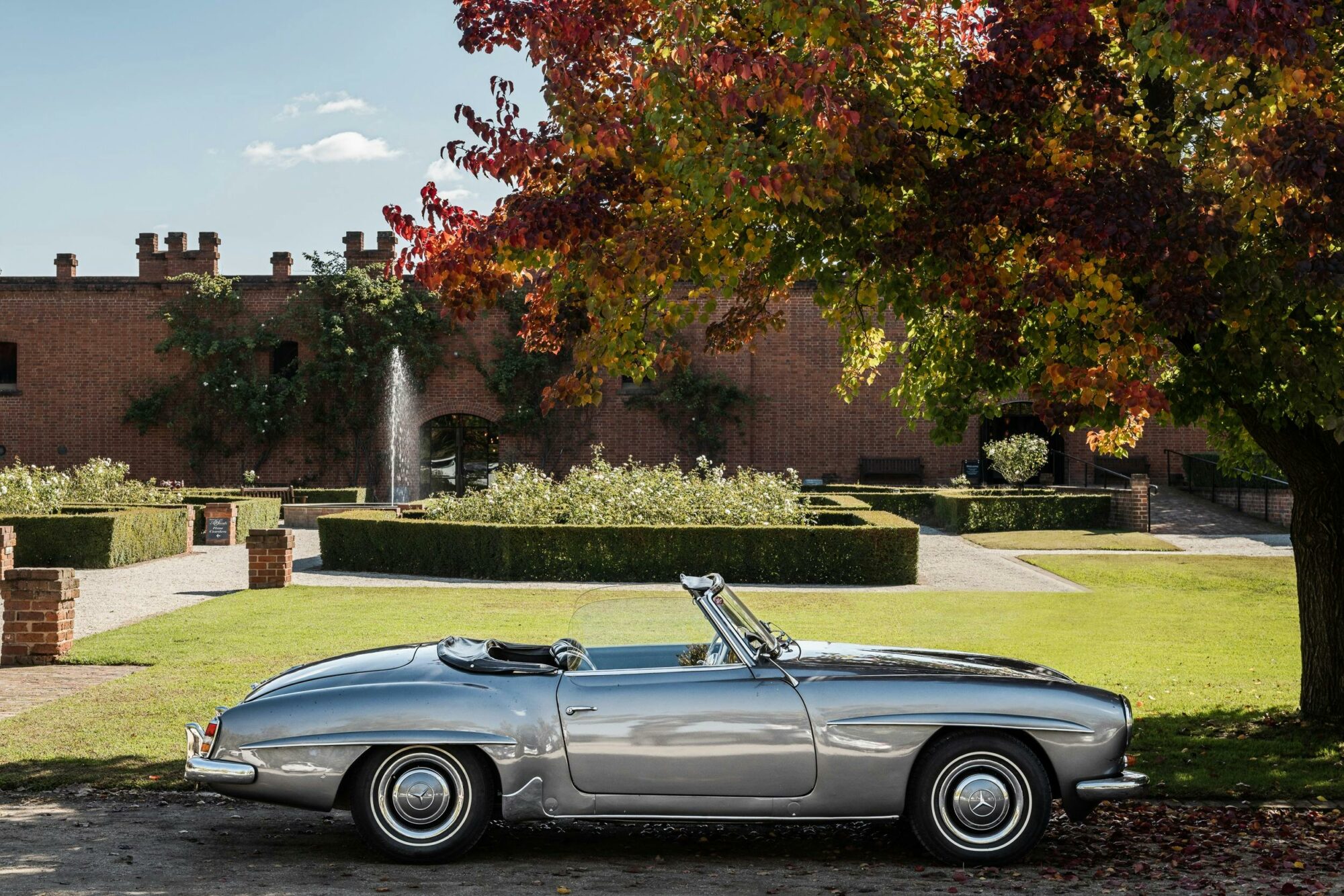 All Saints Estate vintage car outside