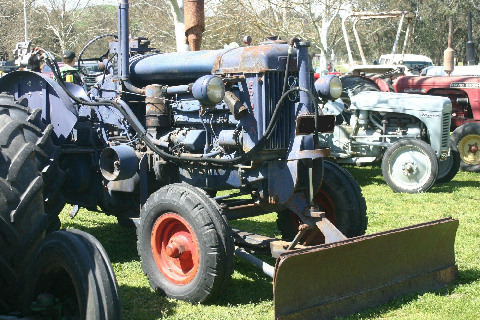 Blue tractor, sunny day