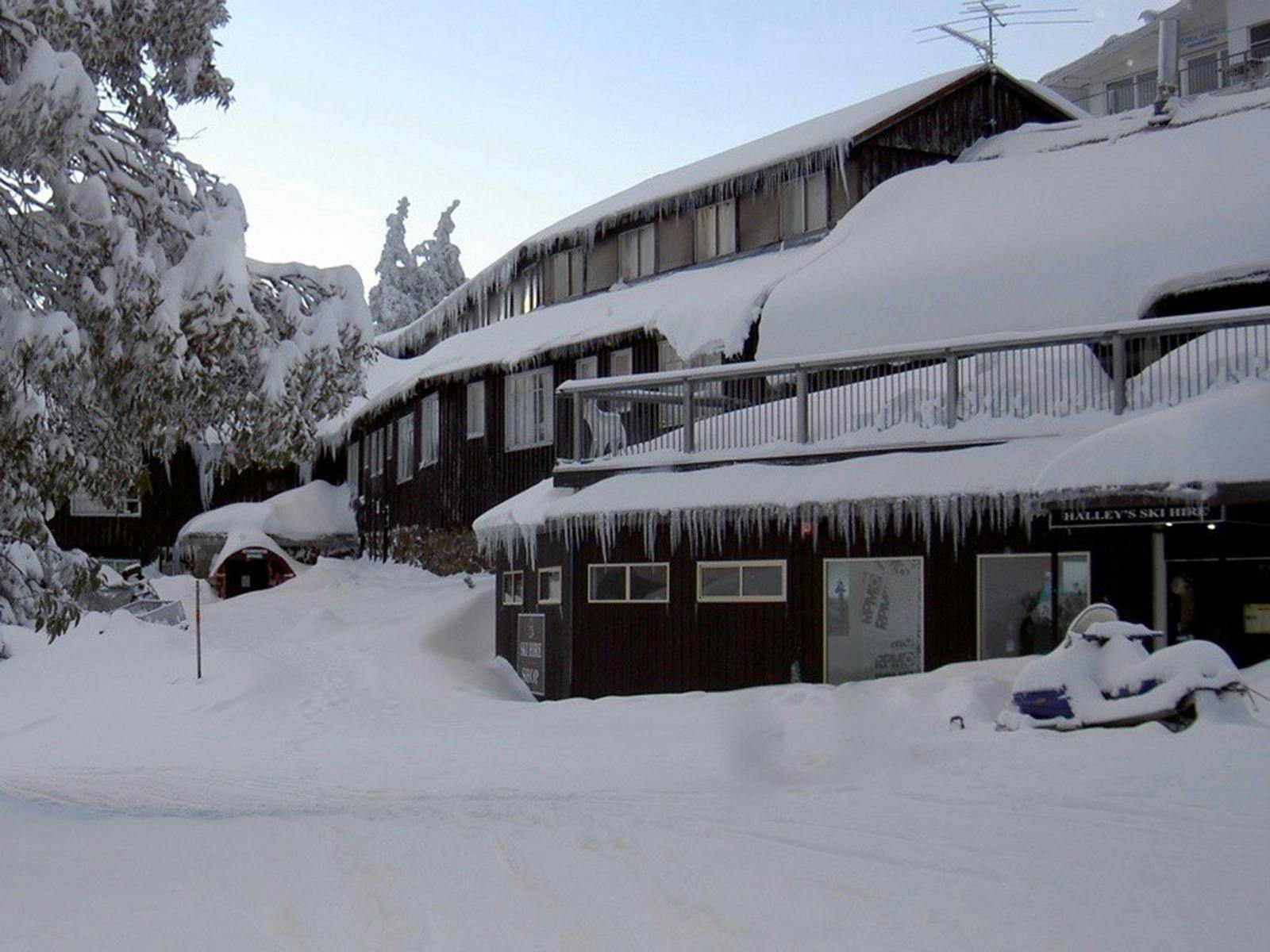 Halleys Lodge exterior covered in snow