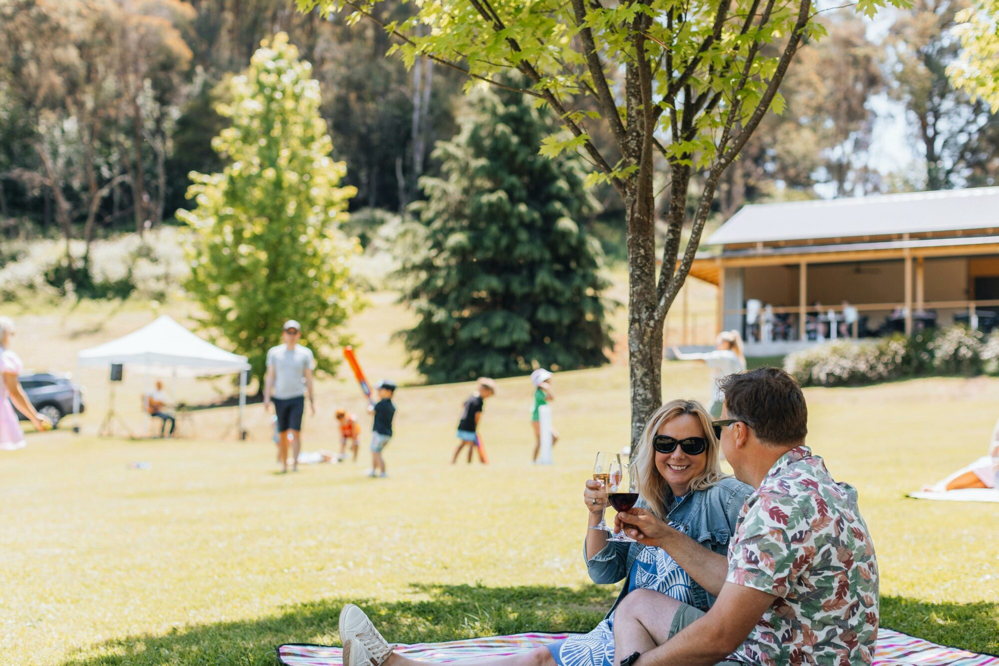 Couple enjoying themselves on the lawn at Ringer Reef