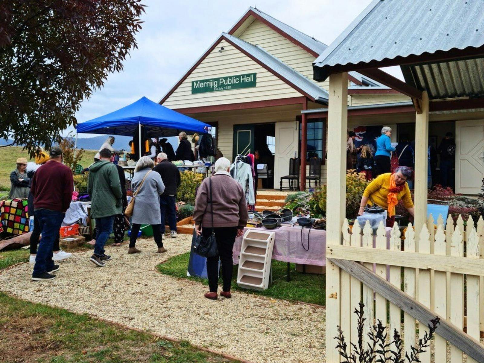 attendees view stalls at the front of the hall