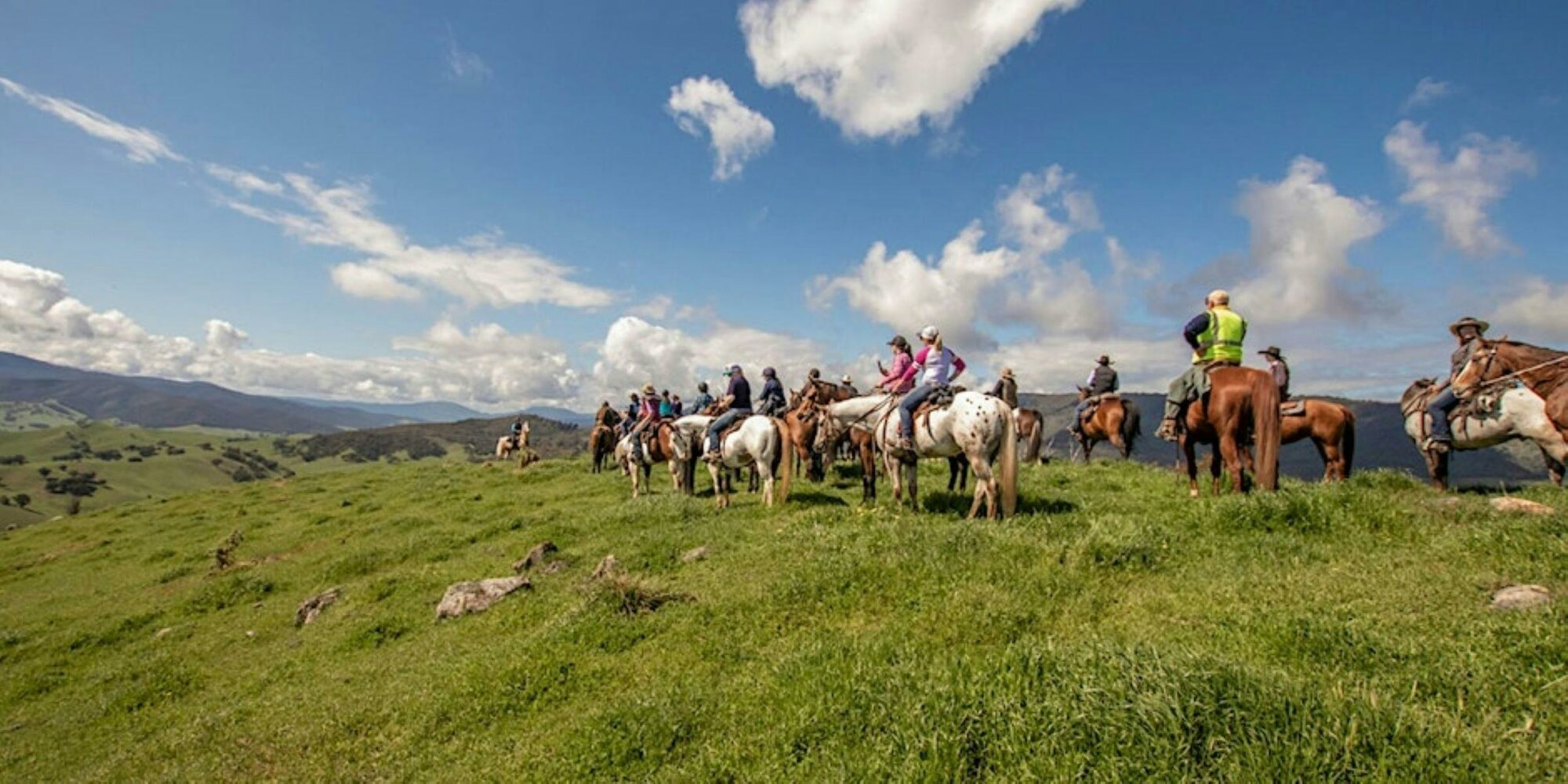 Stunning views, green grassy hills in the foothills of the Australian Moutains on horse back.