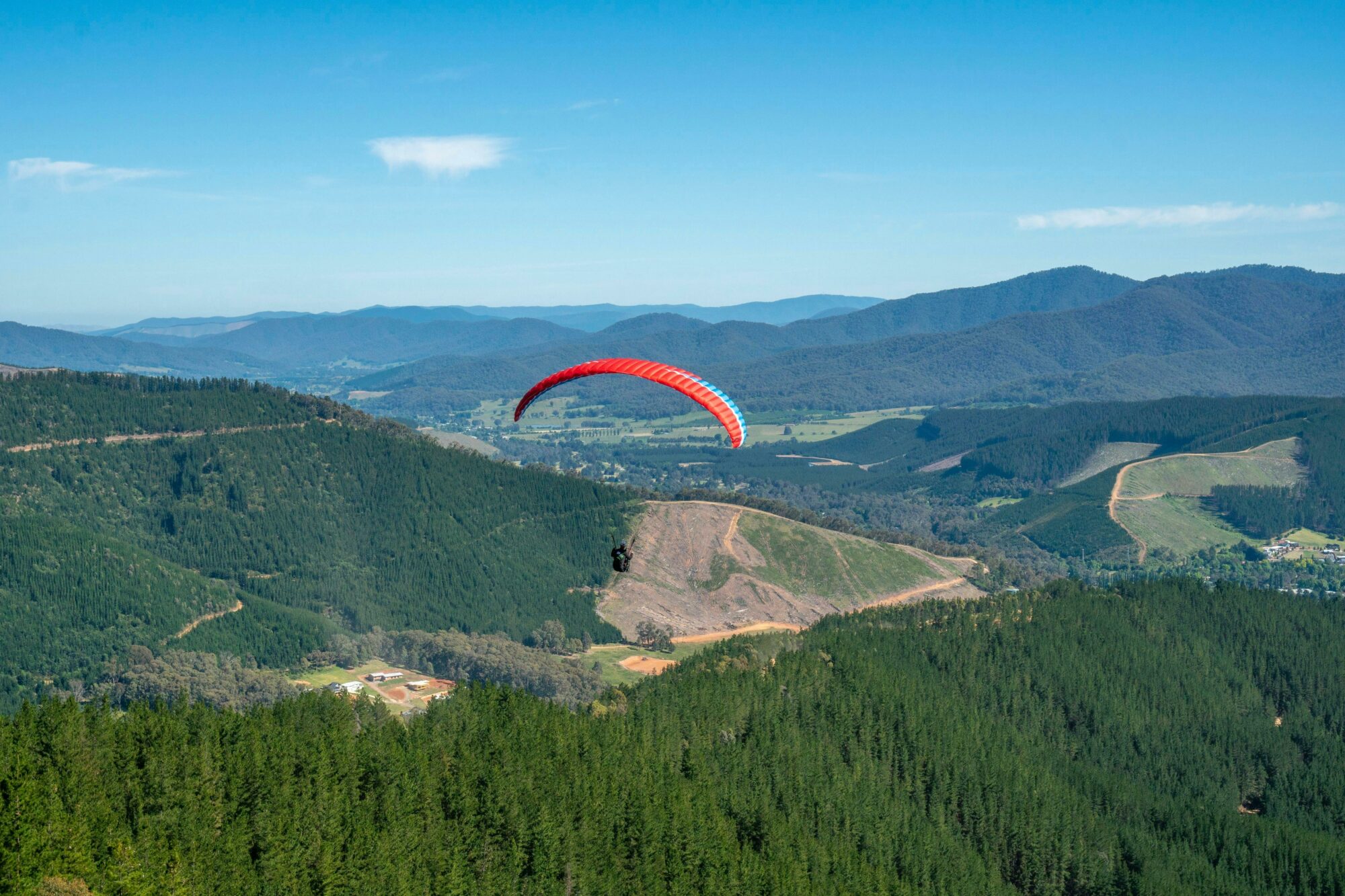 Paraglider above Bright Mountains