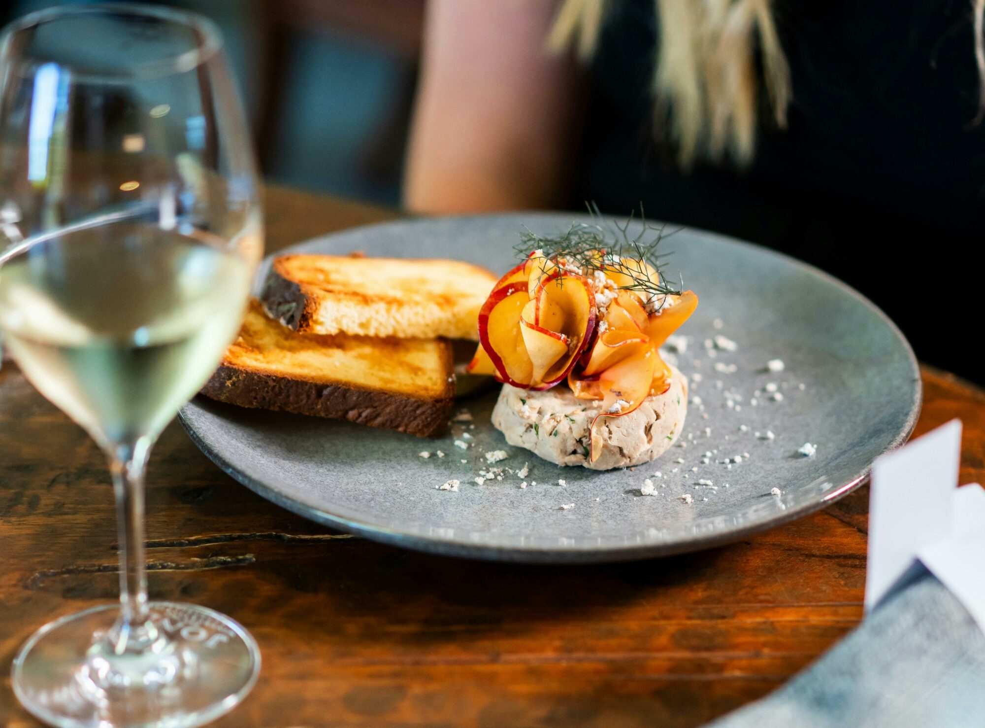 Plate of Pork rilette with glass of wine