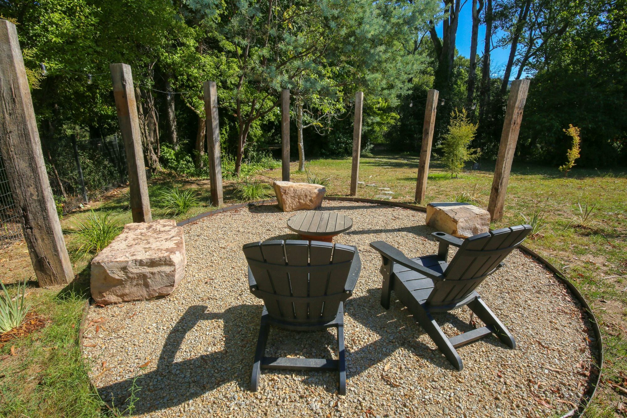 outdoor seating space with two reclined chairs