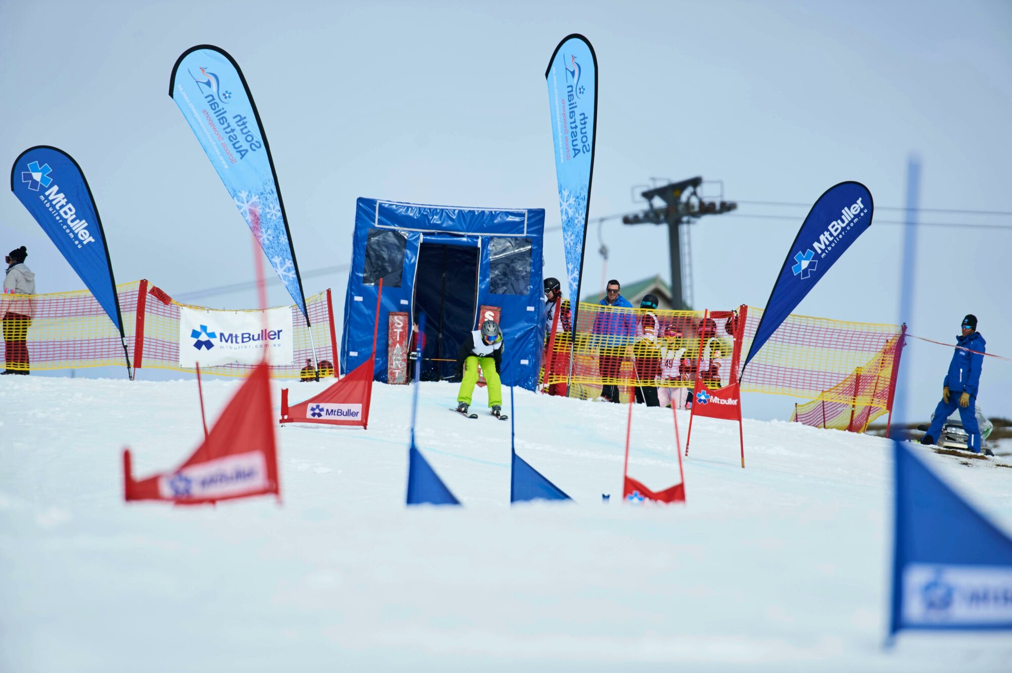 a child skiing amongst flags at Mt Buller