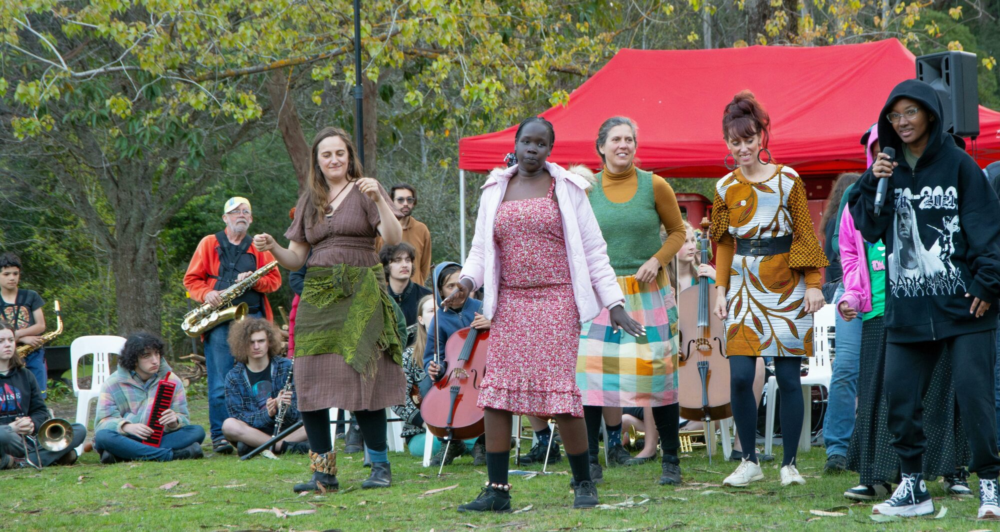people dancing in the foreground, band in the background