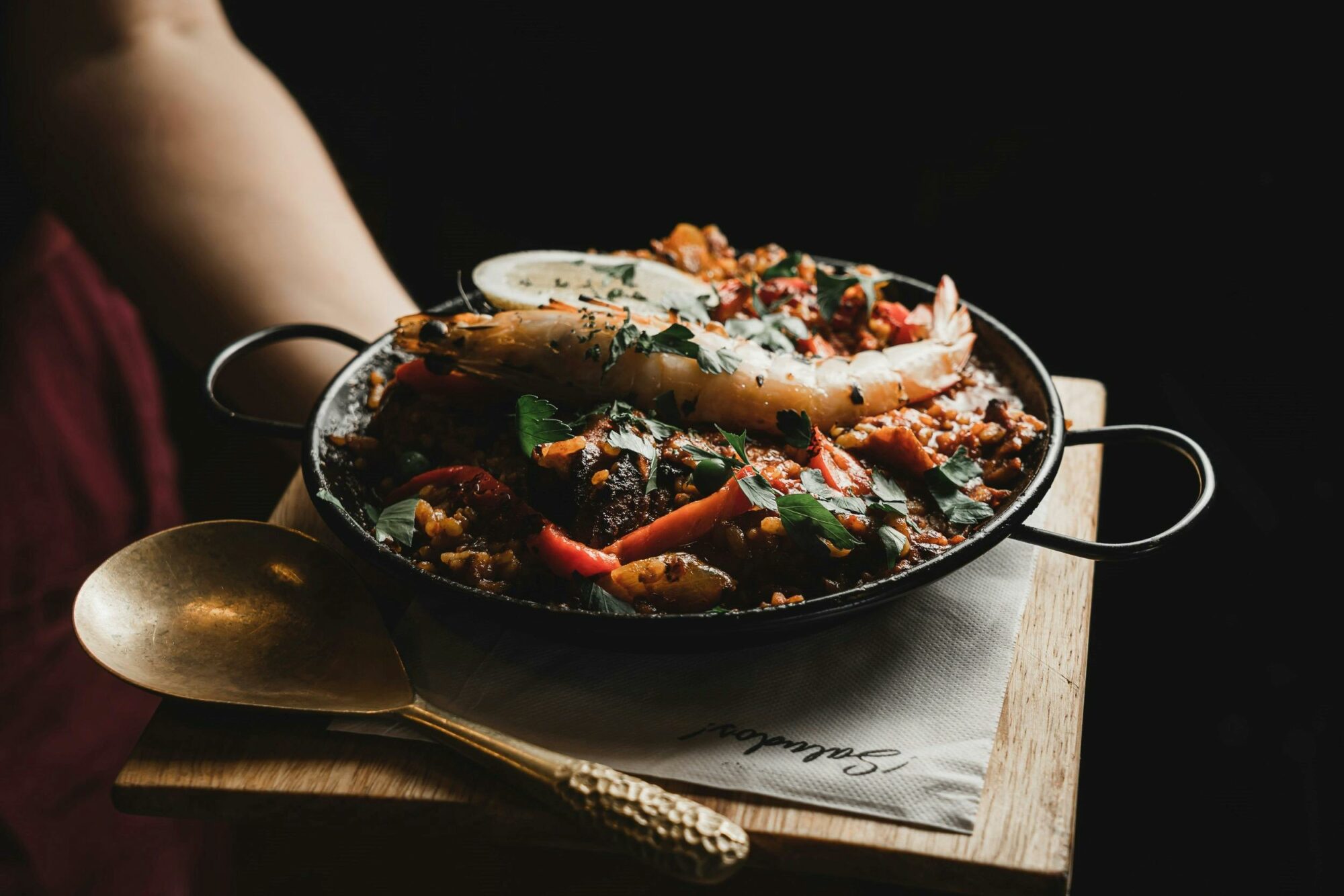 dish of paella and spoon