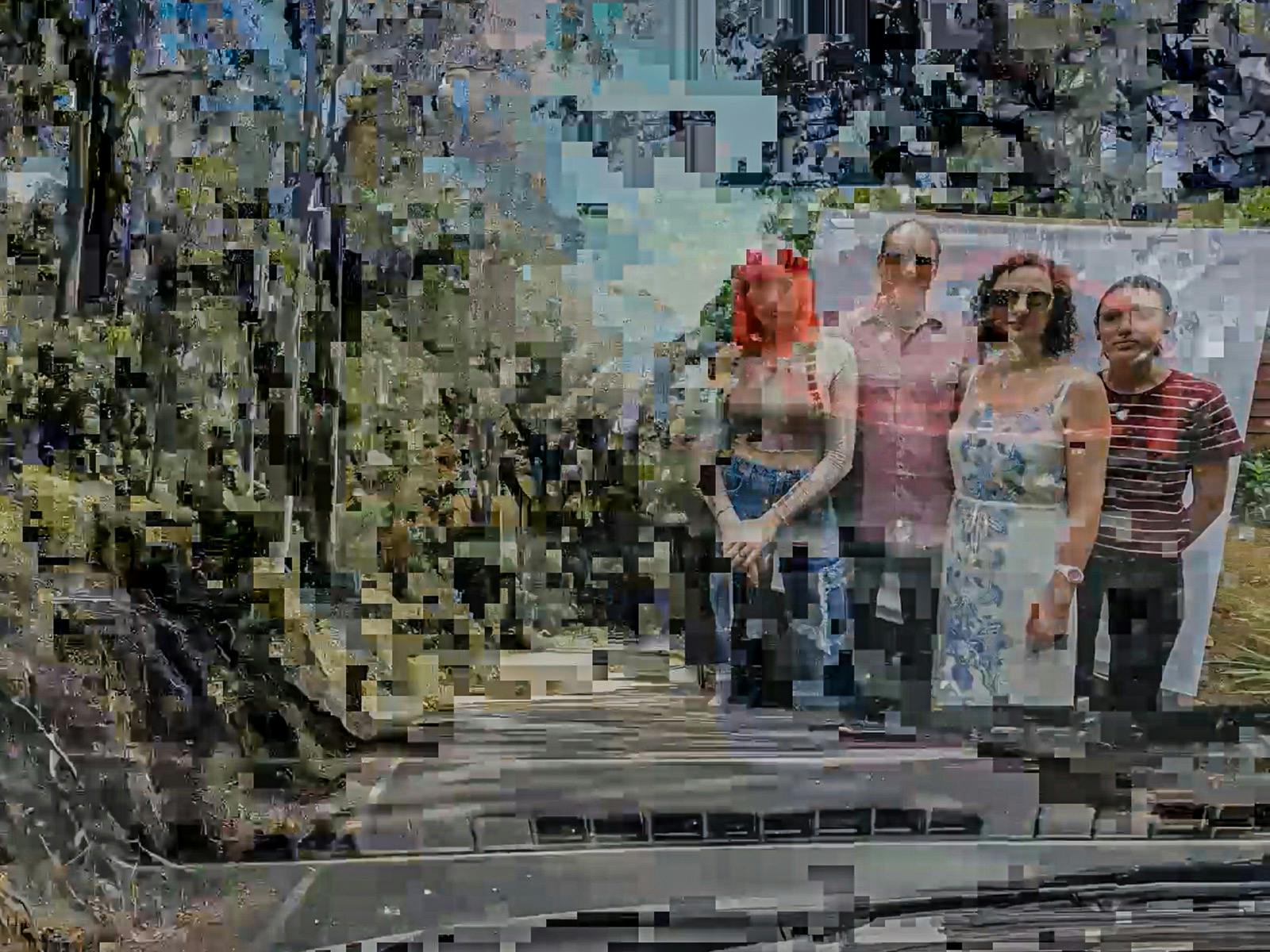 Pixelated image of family in nature with road