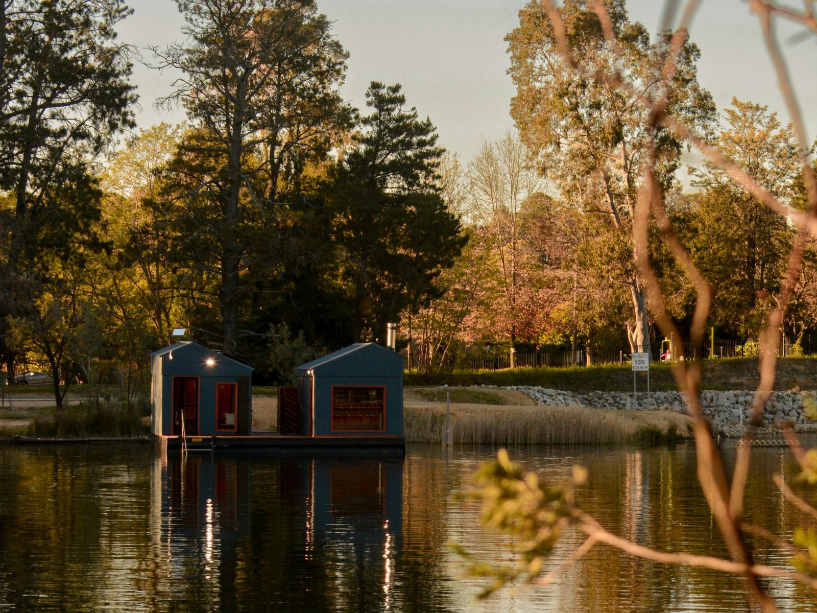 Exterior view of the Stillwater Saunas floating sauna on Lake Sambell in Beechworth