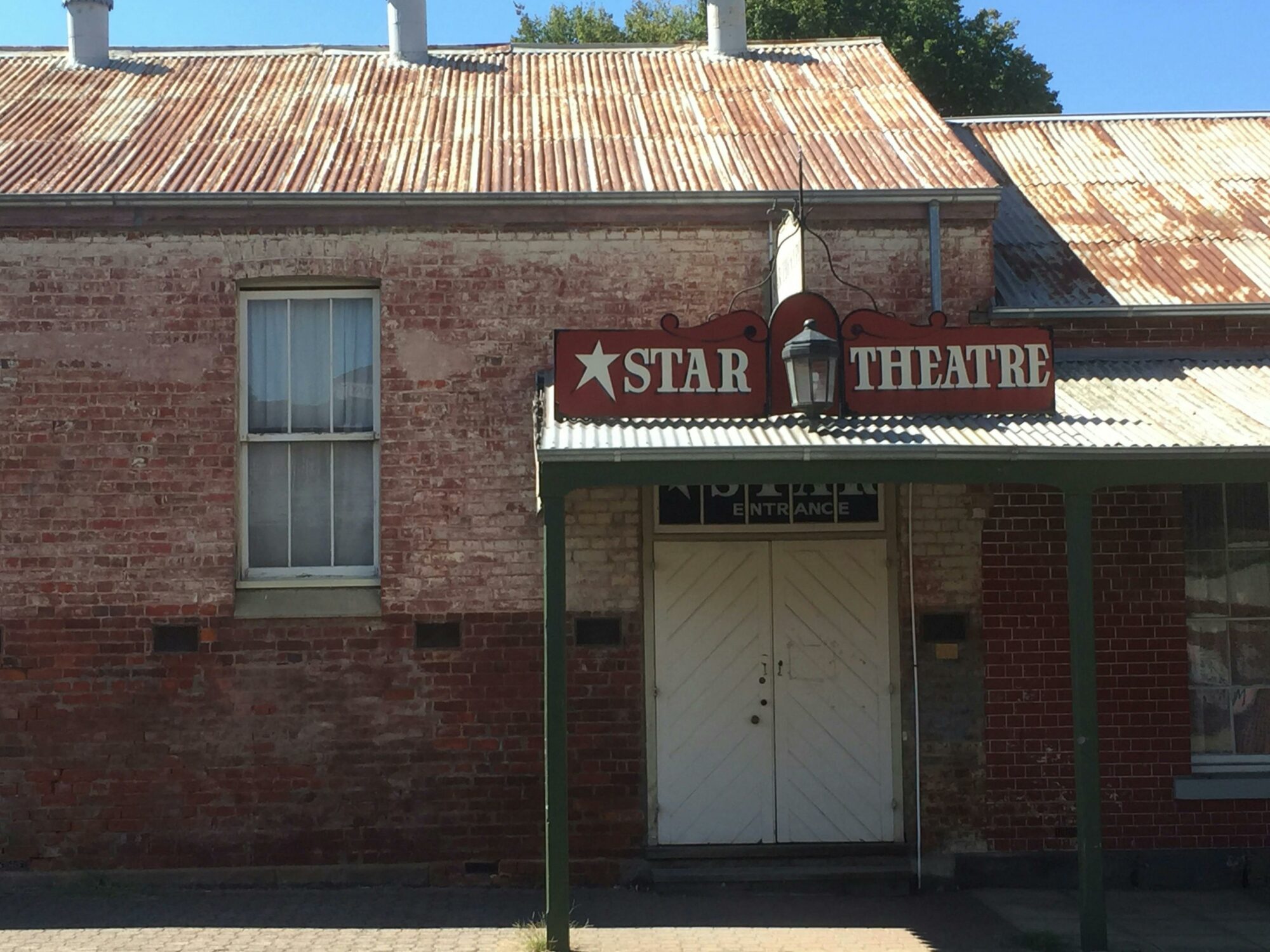Star theatre sign above door
