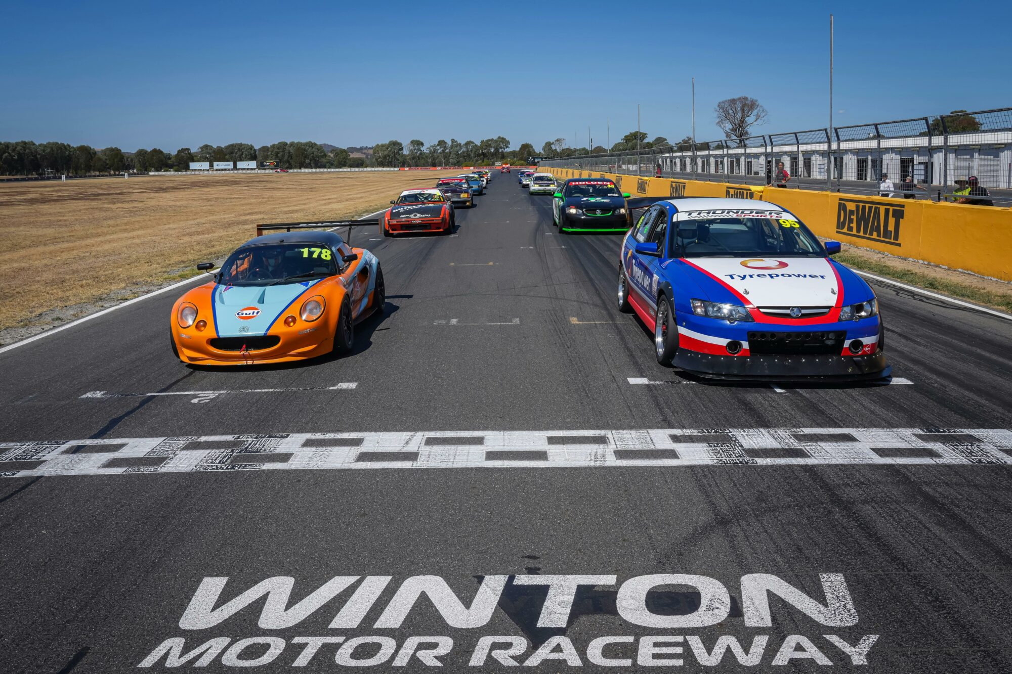 Racing cars on a grid