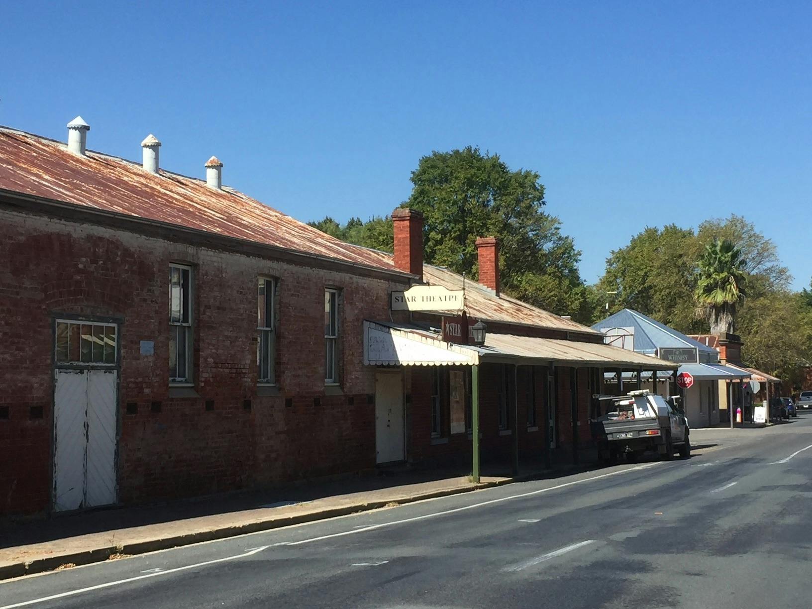 red brick building 2 side entrances.
