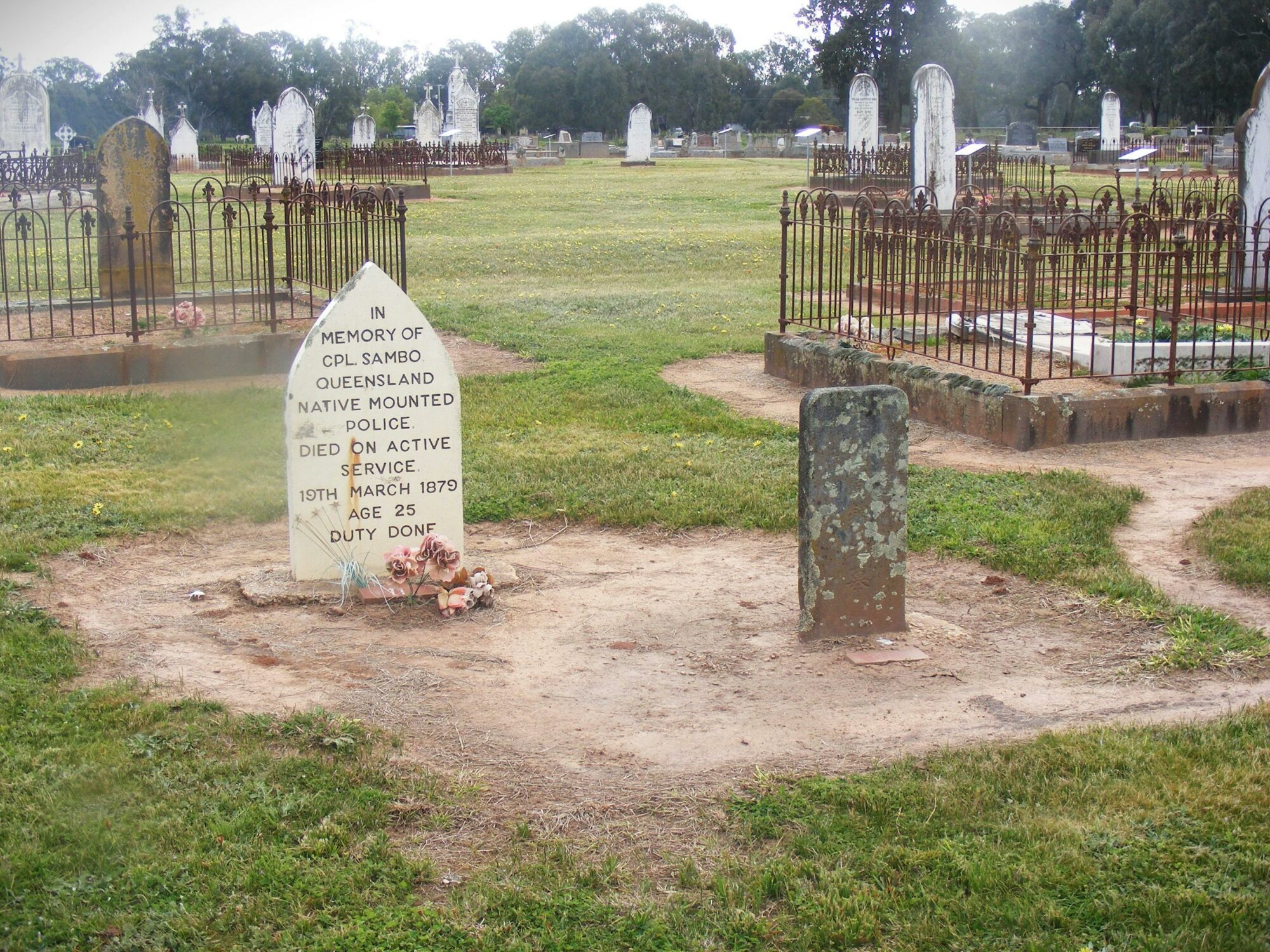 Corporal Sambo Headstone alongside the footstone of a Chinese migrant in search for gold.