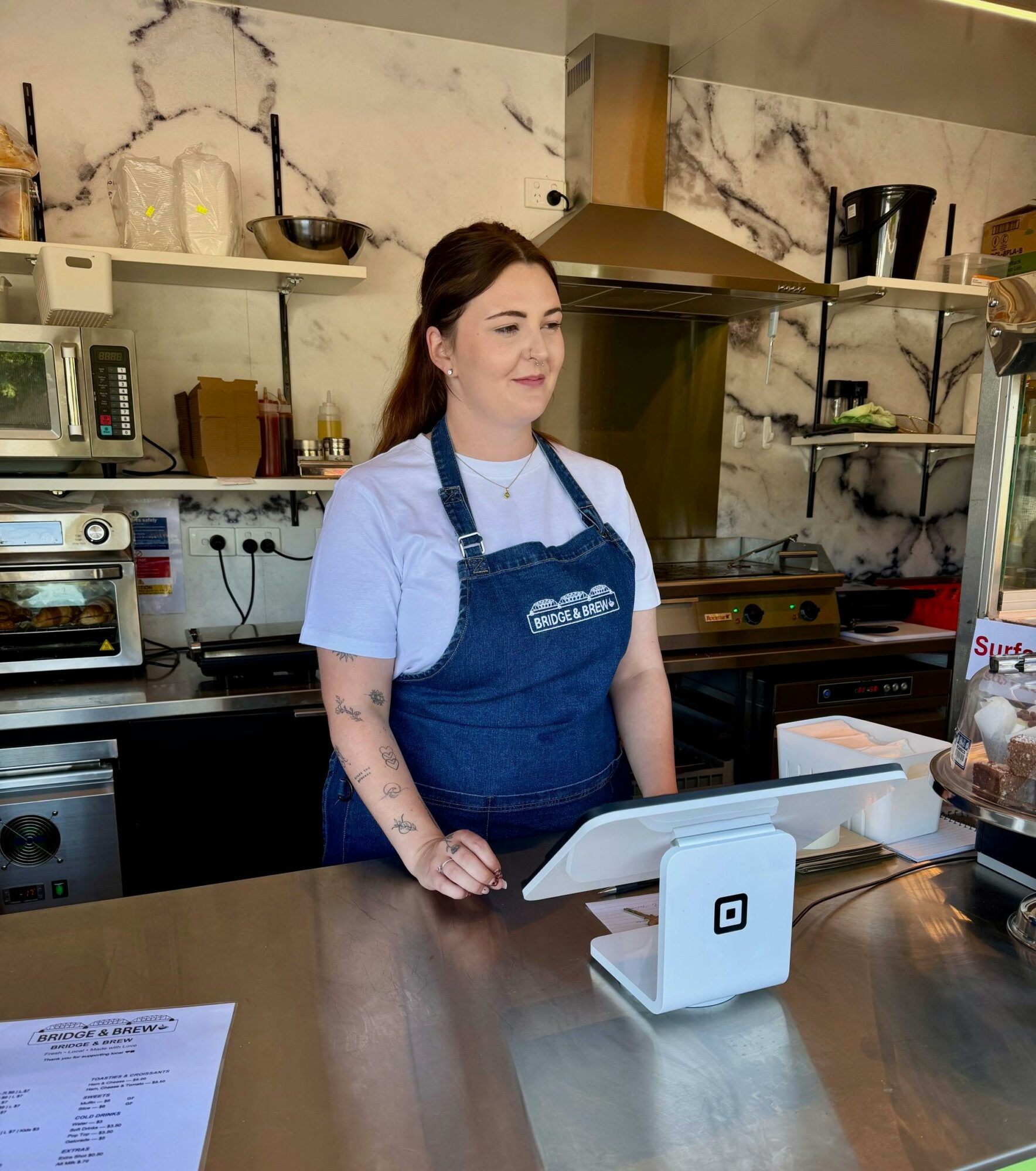 Staff member at counter