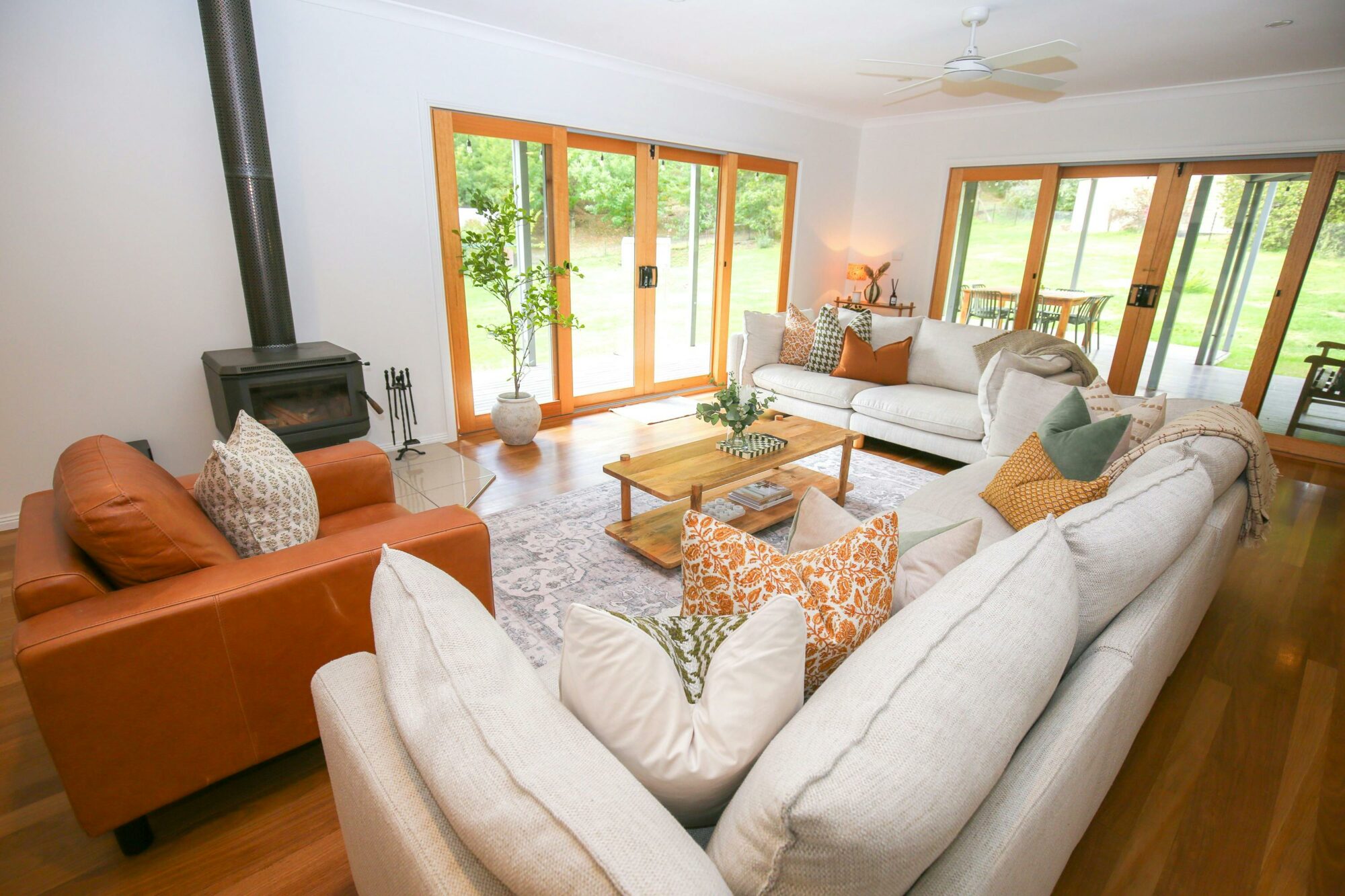 Loungeroom with fireplace at Wandi Hideaway