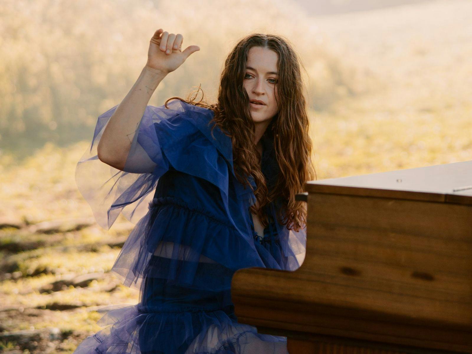 Meg Washington at a grand piano