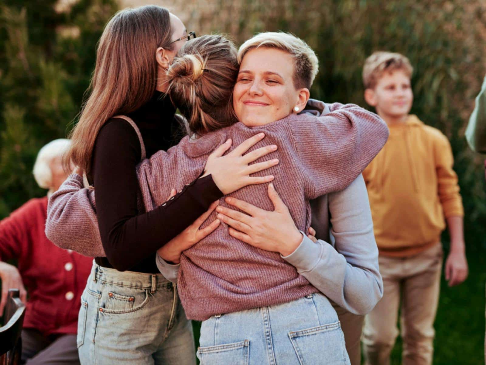 A group of girls embracing
