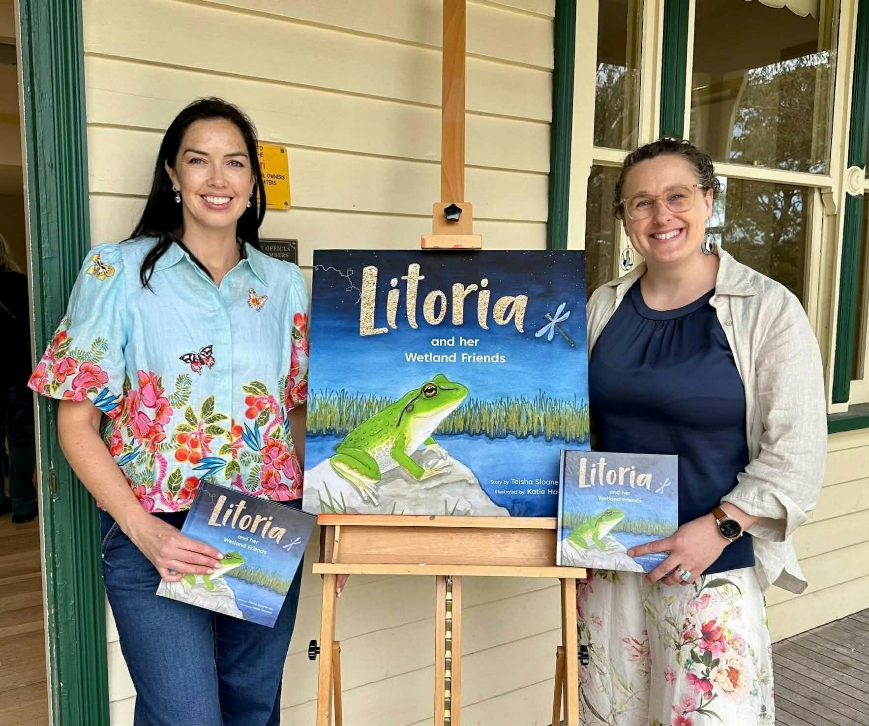 Author Teisha Sloane-Lay and illustrator Katie Howard with book Litoria and her Wetland Friends