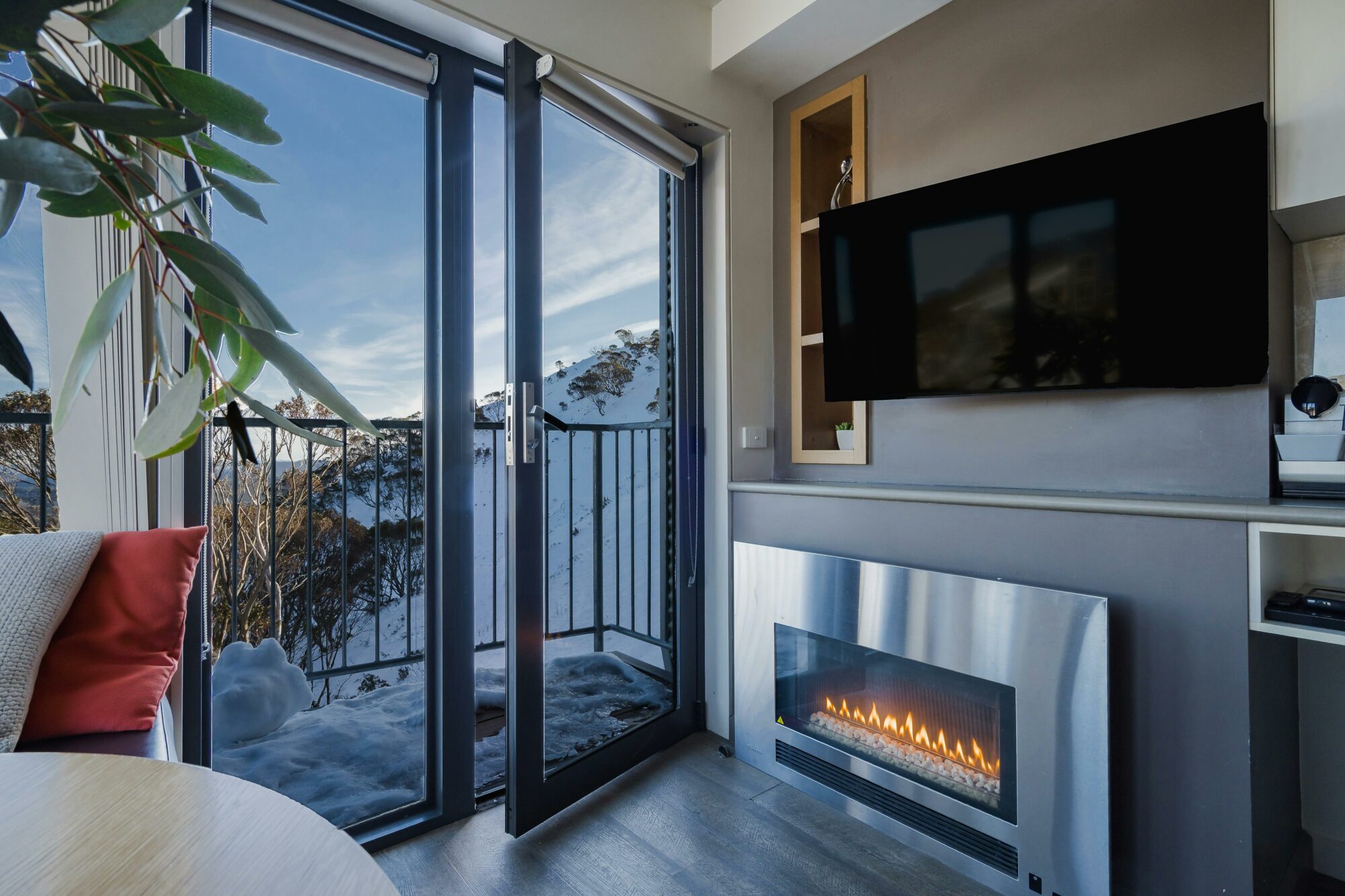 Gas fire place, smart TV and balcony in the studio apartments