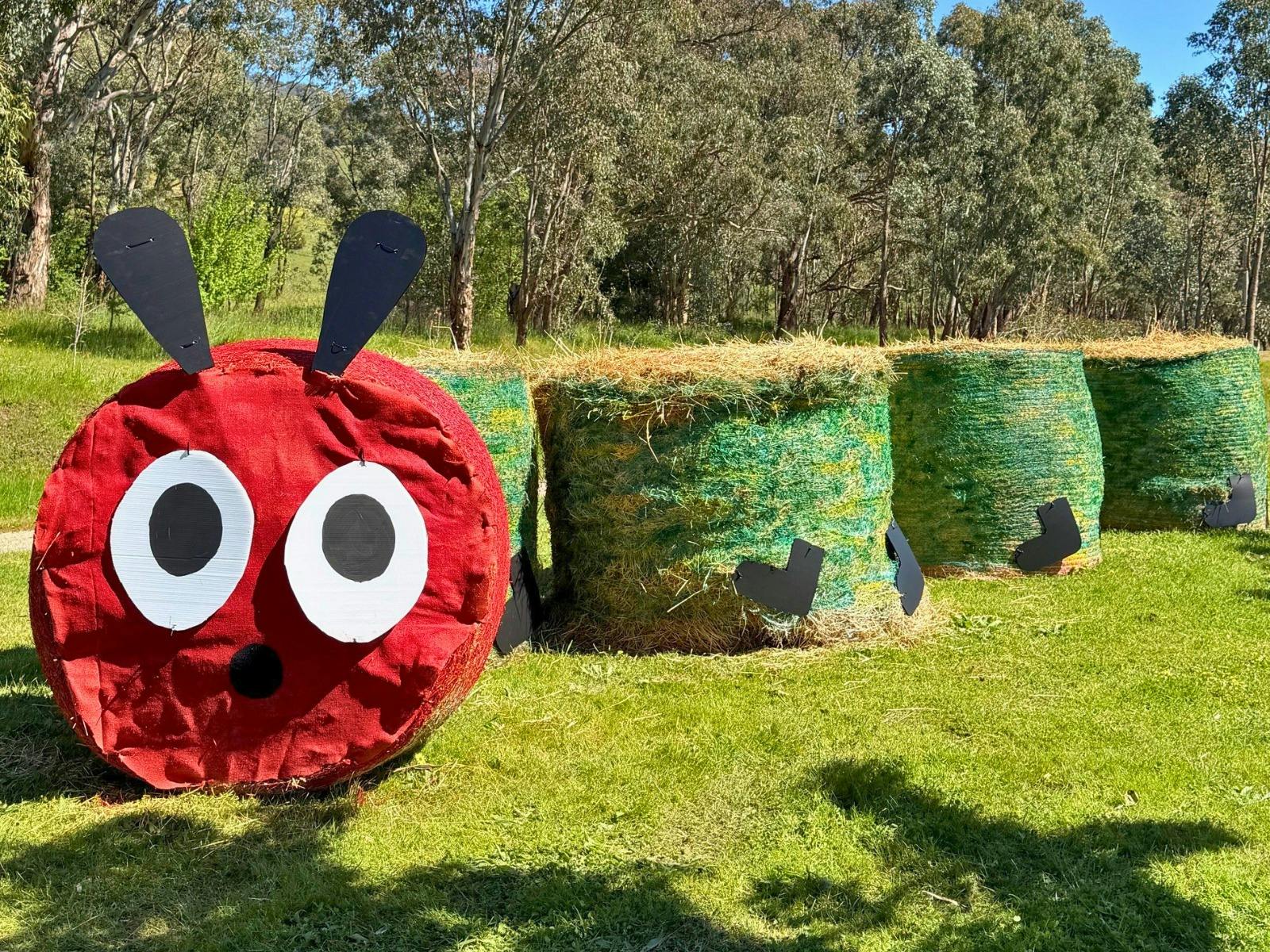 The Very Hungry Caterpillar made out of round hay bales located in Tallangatta
